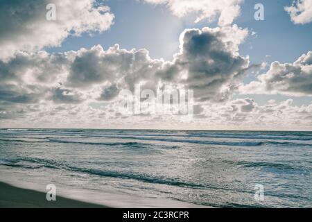Abstract seascape background. Blue ocean and dramatic cloudy sky Stock Photo