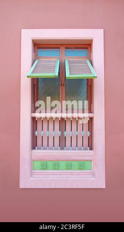 Detail from a balcony on pink wall in the neighborhood Las Penas. It is known for its colonial architecture Stock Photo