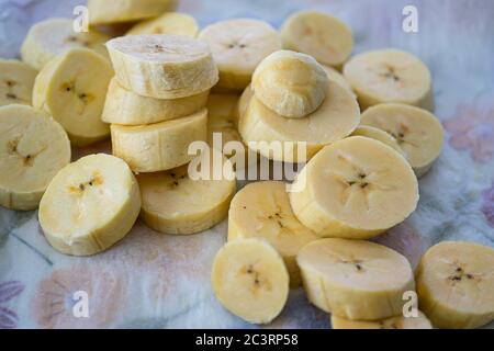 Raw Plantain Slices ready to deep fry to make Dodo Stock Photo