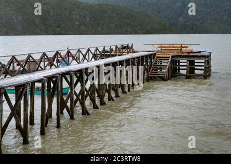 Tiny coastal hamlet Caleta Tortel located in the midst of Aysen in Chile Stock Photo