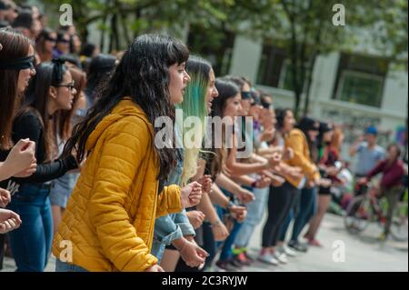 Feminist demonstrators, part of the me too revolution protest in the National University of Colombia to protest against women violence and president I Stock Photo