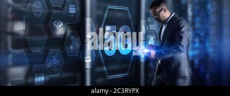 Businessman on blurred server provider background using 5G network. Abstract image 5G hologram. Stock Photo