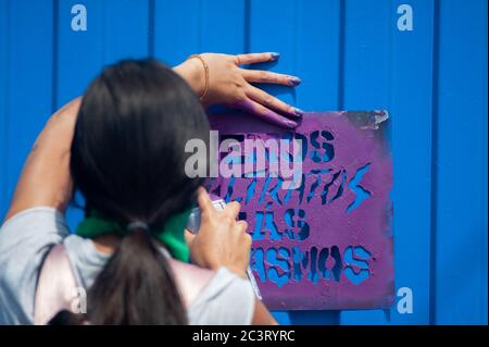 Demonstrations of the International womans day in Colombia take place to protest against feminicides and violence against women in Colombia. Stock Photo