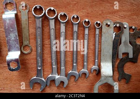 row of spanners on home made rack in a workshop Stock Photo