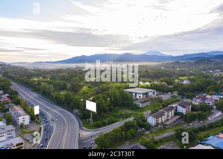 Aerial image of car moving on Kota Kinabalu City, Sabah, Malaysia Stock Photo