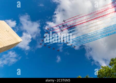 Royal Air Force Red Arrows and French Air Force Patrouille de France display teams joint flypast over London to honour the 80th anniversary de Gaulle Stock Photo