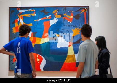 People looking Hirondelle Amour of Joan Miró (Spanish, 1893–1983) at Museum of Modern Art ( MOMA).  The Museum of Modern Art, New York. Stock Photo