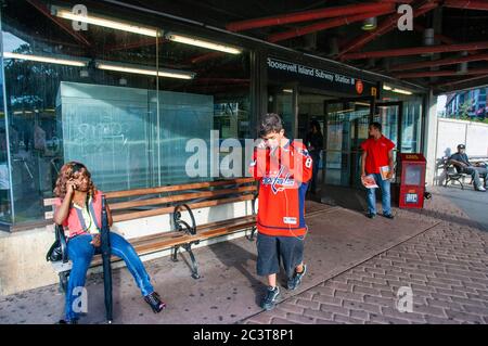 Village Green, Roosevelt Island subway station, NYC, USA. Roosevelt Island is a narrow island in New York City's East River, USA Stock Photo