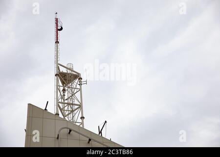 signal tower on top of building Stock Photo