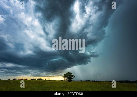 Supercell storm clouds with intense tropic rain Stock Photo