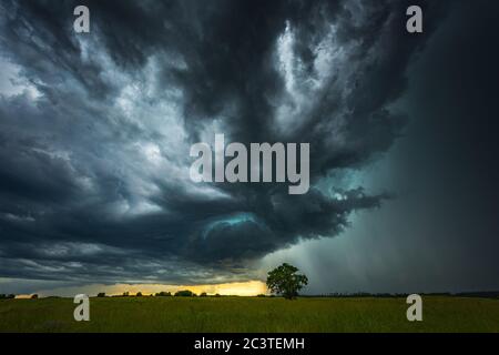 Supercell storm clouds with intense tropic rain Stock Photo