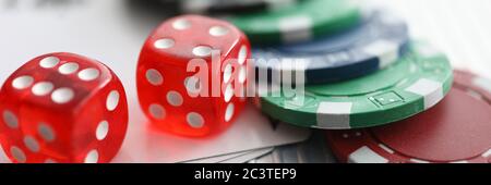 Close up on table are dice chips playing cards Stock Photo