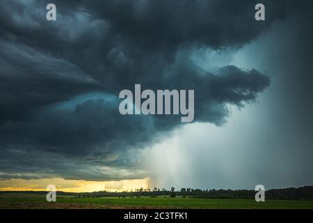 Supercell storm clouds with intense tropic rain Stock Photo - Alamy