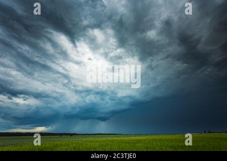 Supercell storm clouds with intense tropic rain Stock Photo