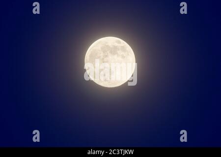 The Moon, with moonglow, Norfolk, UK Stock Photo