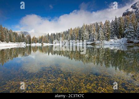 mountain lake at the Tre Cime di Lavaredo in winter, Italy, South Tyrol, Dolomites, Trento Stock Photo