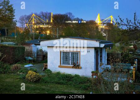 allotment garden in front of BVB Stadion Signal Iduna Park in the evening, Germany, North Rhine-Westphalia, Ruhr Area, Dortmund