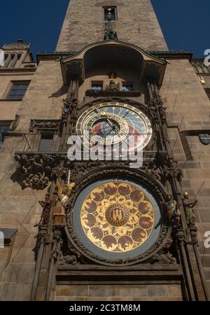 The medieval Astronomical clock of Prague on the tower of the town hall of Old Town as seen from below. Stock Photo