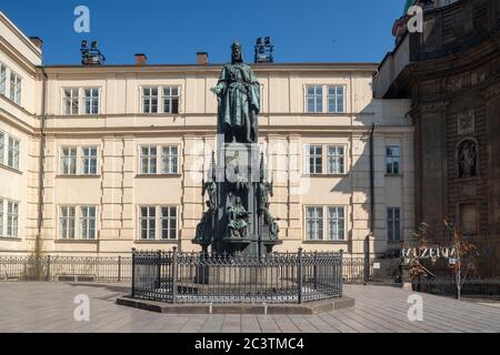 Neogothic statue of Holy Roman Emperor and Czech king Charles IV. of the Luxembourg dynasty near the Charles Bridge in Prague. Built in 1848. Stock Photo