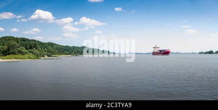 Red Boat on the river Elbe near by Hamburg Stock Photo