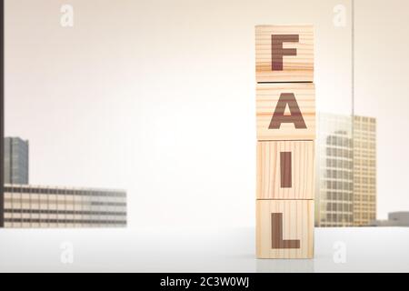 Stacked wooden cube with the fail letter on the table Stock Photo - Alamy