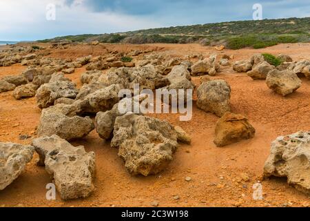 Landscape with stones on Akamas Lara Beach promontory sea shore in Cyprus Stock Photo