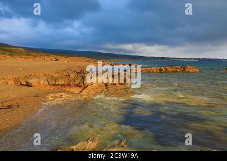 Rocky shore Lara beach on Akamas peninsula in Cyprus Stock Photo