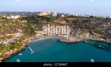 Aerial bird's eye view of Konnos beach in Cavo Greco Protaras, Paralimni, Famagusta, Cyprus. The famous tourist attraction golden sandy Konos bay with Stock Photo