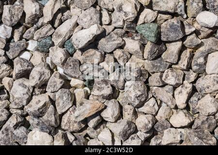 Cotswold stone chippings or stone gravel. Stock Photo