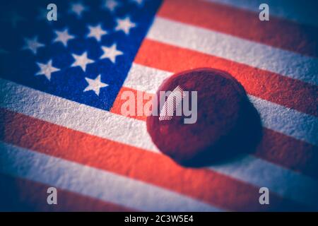 Drops of blood on flag of the United States, violent riots after police violence in the US, Blutstropfen auf Fahne von der USA, gewaltsame Ausschreitu Stock Photo