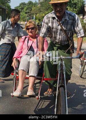 dh Thanlyin YANGON MYANMAR Far east Tourist Woman local Burmese trishaw ride sightseeing tour asia women holiday Stock Photo