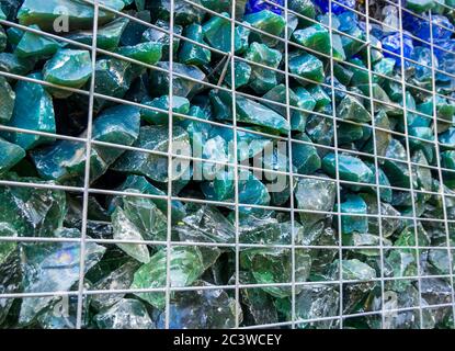 Gabion from stones of multi colored glass mass Stock Photo