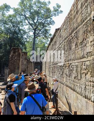 Detail of bas relief carvings on the walls at the Angkor Thom temple complex, Siem Reap, Cambodia, Asia Stock Photo