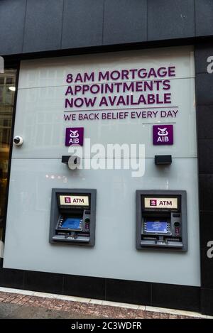 Dublin, Ireland - December 30, 2019: Bank branch and two ATM of Allied Irish Banks (AIB) in Dublin, Ireland Stock Photo