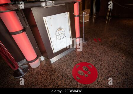 Paris, France. 22nd June, 2020. Social distancing markers are installed on the ground before Le Grand Rex cinema reopens in Paris, France on June 22, 2020. France, which gradually eased national lockdown from May 11, entered a new phase of de-confinement on Monday. Cinemas and casinos resumed activities and sports event attracting no more than 5,000 people would be allowed. Credit: Aurelien Morissard/Xinhua/Alamy Live News Stock Photo