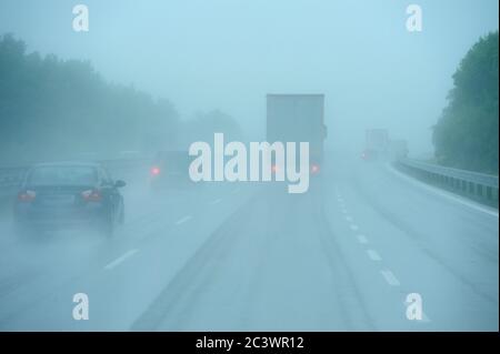road, highway, trip, road conditions, rain, fog, slippery, danger,road, highway, trip, transport,long vehicle Stock Photo