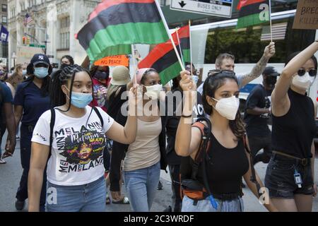 Demonstration and march near NYC City Hall on Juneteenth keeps up the pressure to end police brutality, especially against blacks, and to change the system to reflect true equality for all citizens. New York City. Stock Photo