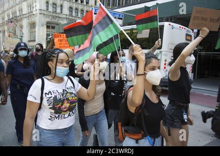 Demonstration and march near NYC City Hall on Juneteenth keeps up the pressure to end police brutality, especially against blacks, and to change the system to reflect true equality for all citizens. New York City. Stock Photo