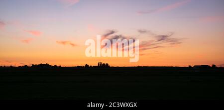 Panoramic view of colorful sky over dutch plain Stock Photo