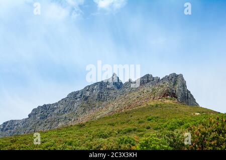 views from the base of the famous table mountain in cape town, south africa with a blue sky and nice clouds Stock Photo