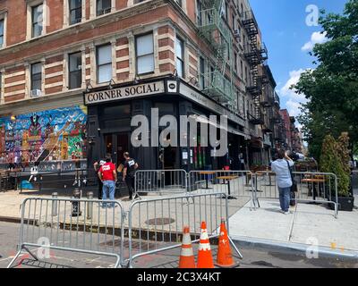 New York, USA. 22nd June, 2020. (NEW) Phase 2 reopening in New York City. June 22, 2020, Harlem, New York, USA: Phase 2 of reopening includes hair salons and barbershops, houses of worships like churches, mosques, synagogue, outdoor dining, offices, in-store retail, real estate services and car sales and rentals Ã¢â‚¬' all with social distancing and hygiene guidelines. About 300,000 workers are going to be back to work during this phase.Credit: Niyi Fote /Thenews2 Credit: Niyi Fote/TheNEWS2/ZUMA Wire/Alamy Live News Stock Photo