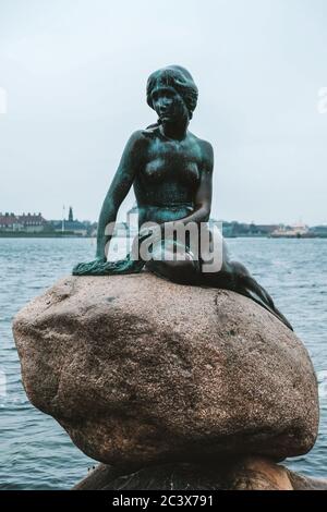 Copenhagen / Denmark - November 2019: A famous landmark in Copenhagen: The Little Mermaid statue called Den lille Havfrue depicting the fairytale girl Stock Photo