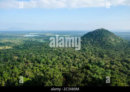 Scenic view at Pidurangala Rock hill from the top of Lion Rock Fortress. Hiking in Sri Lanka: beautiful viewpoint at famous historical site Sigiriya Stock Photo