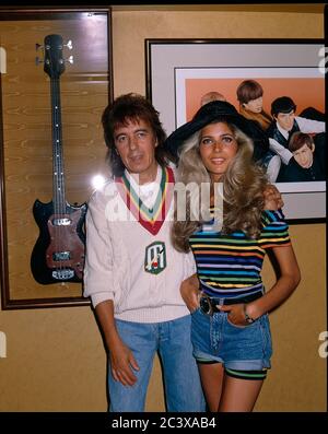 Bill Wyman with her fiancee Mandy Smith at Wyman's Sticky Fingers restaurant 2nd June 1989 Stock Photo