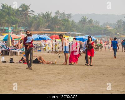 Goa, India - December 12, 2018: Arambol beach in Goa with tourists. Stock Photo