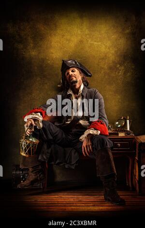 Portrait Of A Pirate Drinking Rum, Sitting In A Tavern Stock Photo - Alamy