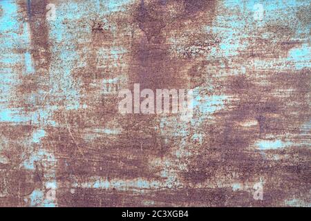 Rusted metal with blue paint. Rust and oxidized metal background. Old metal surface, closeup, texture Stock Photo