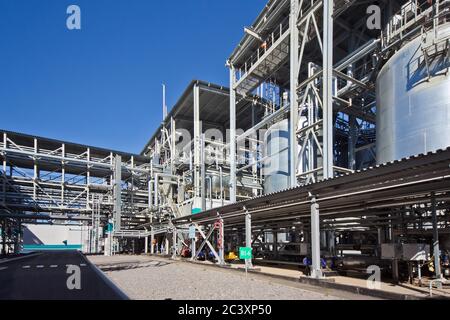 Chemical polymer factory. Production line of thermoplastic. Stock Photo