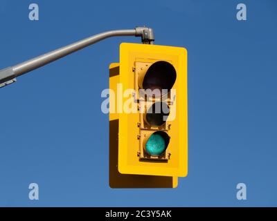 a American traffic signal light with the green light lit Stock Photo