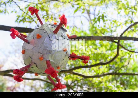 Pinata hanging from tree hi-res stock photography and images - Alamy